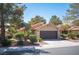 Charming single-story home featuring a two-car garage and beautiful desert landscaping at 7913 Sailboat Ln, Las Vegas, NV 89145