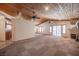Spacious living area showcasing wood ceilings, fireplace, and open floor plan at 7913 Sailboat Ln, Las Vegas, NV 89145