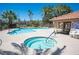 Community pool with a hot tub, seating and lounge area at 7913 Sailboat Ln, Las Vegas, NV 89145