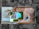 Aerial view of property highlighting compact yard with pool, stylish design, and desert surroundings at 8645 Edmond St, Las Vegas, NV 89139
