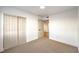 Bedroom with carpet, white walls, a closet, and natural light at 8645 Edmond St, Las Vegas, NV 89139