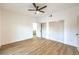 Bright bedroom with light vinyl flooring, modern ceiling fan, and double closet for great storage space at 8645 Edmond St, Las Vegas, NV 89139