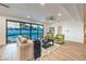 Bright living room with floor to ceiling glass doors, offering views of the pool area and access to the outdoor space at 8645 Edmond St, Las Vegas, NV 89139