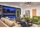 Open-concept living room with a sliding glass door to the outdoor pool at 8645 Edmond St, Las Vegas, NV 89139