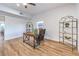 Bright home office featuring wood floors, a writing desk, and ample natural light, ideal for remote work at 8645 Edmond St, Las Vegas, NV 89139