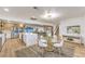 Kitchen, dining and living areas create an open space perfect for entertaining with luxury finishes throughout at 8645 Edmond St, Las Vegas, NV 89139