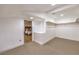 Bright walk-in closet with custom shelving and carpet flooring, adjacent to a bedroom suite at 8645 Edmond St, Las Vegas, NV 89139