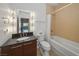 Well-lit bathroom featuring a modern vanity, combination tub and shower at 900 Las Vegas Blvd # 903, Las Vegas, NV 89101