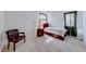 Bedroom featuring plush carpet, natural light, with a bed, nightstand, and chair at 9010 W Lone Mountain Rd, Las Vegas, NV 89129