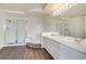 Bathroom featuring double vanity, separate glass shower, and soaking tub at 9776 Whitewater Canyon Ct, Las Vegas, NV 89183