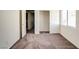Carpeted bedroom featuring a window and closet space at 9776 Whitewater Canyon Ct, Las Vegas, NV 89183