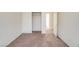 Bedroom featuring standard closet with sliding doors and a door leading to another room at 9776 Whitewater Canyon Ct, Las Vegas, NV 89183