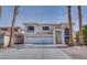 Charming two-story home featuring a three-car garage and a well-maintained, inviting exterior at 9776 Whitewater Canyon Ct, Las Vegas, NV 89183