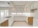 Spacious kitchen features a large window and plenty of counter space at 9776 Whitewater Canyon Ct, Las Vegas, NV 89183