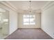 Bright living area with a window view of the pool offering relaxing natural light at 9776 Whitewater Canyon Ct, Las Vegas, NV 89183