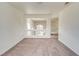 Open loft area with carpet flooring and natural light, providing a versatile space for relaxation or entertainment at 9776 Whitewater Canyon Ct, Las Vegas, NV 89183
