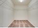 Walk-in closet featuring ample storage with built-in shelving at 9776 Whitewater Canyon Ct, Las Vegas, NV 89183