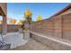 Private backyard featuring hardscape, rock accents, and block wall for added seclusion at 7506 Village Mist Ln, Las Vegas, NV 89113