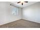 Neutral bedroom with carpet and ceiling fan at 7506 Village Mist Ln, Las Vegas, NV 89113