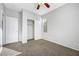 Comfortable bedroom with a closet for storage, and a bright window with views of the outside at 7506 Village Mist Ln, Las Vegas, NV 89113