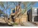 Charming two-story home featuring a well-kept yard and attached single car garage at 7506 Village Mist Ln, Las Vegas, NV 89113