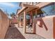 Backyard featuring pavers, stucco wall, covered patio, desert plants and outdoor grill at 8307 Amtrak Express, Las Vegas, NV 89131