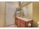 Bathroom featuring light-colored walls, marble countertop, and decorative towel racks at 8307 Amtrak Express, Las Vegas, NV 89131