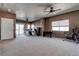 Bonus room with neutral carpet, ceiling fans and natural light at 8307 Amtrak Express, Las Vegas, NV 89131