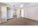 Bright bedroom with plush carpeting and mirrored closet doors, offering space and functionality at 10024 Skipper Ct, Las Vegas, NV 89117