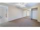 Bright bedroom features neutral tones, plush carpeting, and a mirrored closet for ample storage at 10024 Skipper Ct, Las Vegas, NV 89117