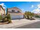 Beautiful two-story home with a three car garage and mature trees at 10024 Skipper Ct, Las Vegas, NV 89117