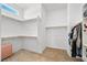 Spacious walk-in closet with ample shelving and racks for organization and storage at 10196 Millholm Ave, Las Vegas, NV 89166