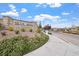 Attractive community entrance sign for Skye Mesa surrounded by lush landscaping at 10196 Millholm Ave, Las Vegas, NV 89166