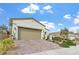 Charming single-story home with a two-car garage and well-maintained front yard landscaping at 10196 Millholm Ave, Las Vegas, NV 89166
