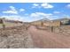 Community walking path with desert landscaping and lighting for evening strolls at 10196 Millholm Ave, Las Vegas, NV 89166