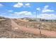 Scenic community walking path offering views of the neighborhood and surrounding landscape at 10196 Millholm Ave, Las Vegas, NV 89166