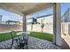 Inviting covered patio with string lights, ideal for relaxing evenings outdoors at 10214 Natural Anchor St, Las Vegas, NV 89166
