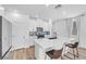 Stylish kitchen featuring white cabinetry, a stainless steel appliance package, and quartz countertops at 10214 Natural Anchor St, Las Vegas, NV 89166