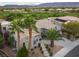 Stunning aerial view of the home showcasing the desert landscape and golf course views at 10261 Largo Sassetta Ct, Las Vegas, NV 89135