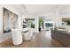 Bright dining room features modern lighting, elegant decor, and open floorplan at 10261 Largo Sassetta Ct, Las Vegas, NV 89135