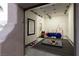 Garage featuring a flexible space perfect for a gym or workshop, with options for various uses at 10261 Largo Sassetta Ct, Las Vegas, NV 89135