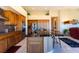 Modern kitchen featuring a granite island, stainless steel appliances, and ample cabinetry at 10524 Longwood Dr, Las Vegas, NV 89134