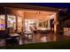 Patio with comfortable lounge seating and fire pit providing a relaxing space for entertaining at 10524 Longwood Dr, Las Vegas, NV 89134