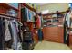 Walk-in closet with shelves and hanging racks for clothing and storage at 10524 Longwood Dr, Las Vegas, NV 89134