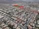 Real estate aerial view of a neighborhood, with similar single-story detached houses and community park nearby at 1109 Pincay Dr, Henderson, NV 89015