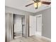 Well-lit bedroom features built-in closet organizers with updated paint and trim at 1109 Pincay Dr, Henderson, NV 89015