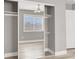 Bedroom closet with sliding mirror doors and shelving at 1109 Pincay Dr, Henderson, NV 89015