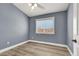 Cozy bedroom with new floors, neutral paint, and a bright window overlooking the neighborhood at 1109 Pincay Dr, Henderson, NV 89015
