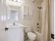 Clean bathroom with white cabinetry, updated sink, and shower/tub combination at 11091 Parete Ct, Las Vegas, NV 89141