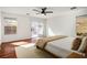 Bright bedroom with hardwood floors and sliding door to the backyard at 11091 Parete Ct, Las Vegas, NV 89141